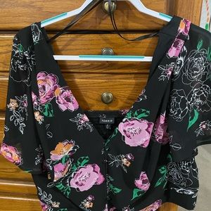 Crop top style that can be worn off the shoulders from Torrid.